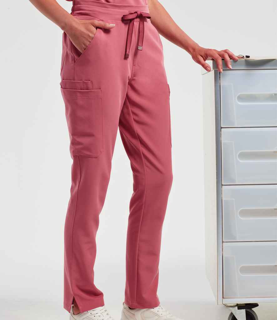 Stay stylish and comfortable with our Beauty Scrub Trousers, crafted from breathable, four-way stretch fabric. Durable, crease-resistant, and easy-care, featuring an elasticated waistband, multiple pockets, and ribbed cuffs. Perfect for beauty professionals.